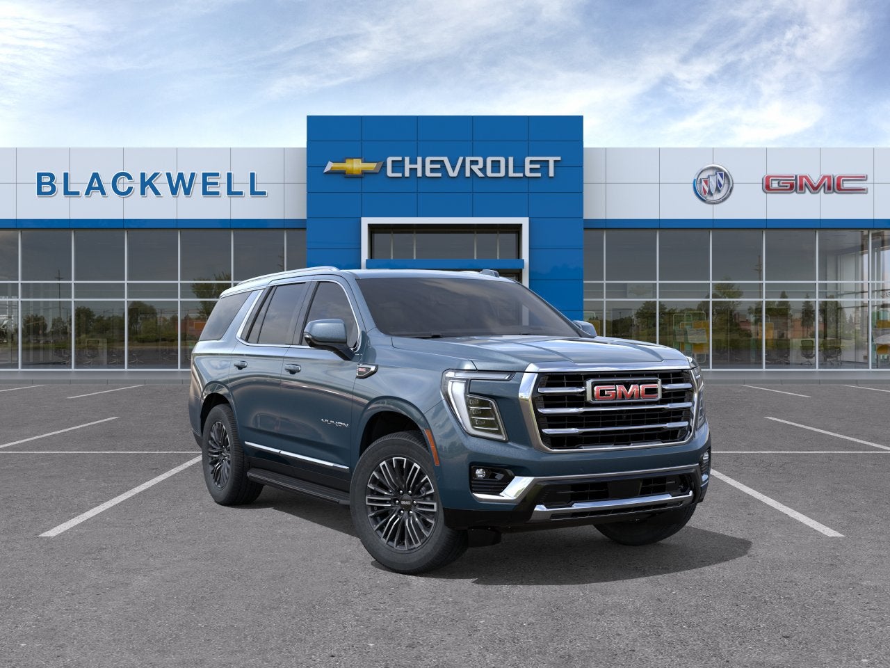 2026 GMC Yukon Elevation in Downpour Metallic — front three-quarter view