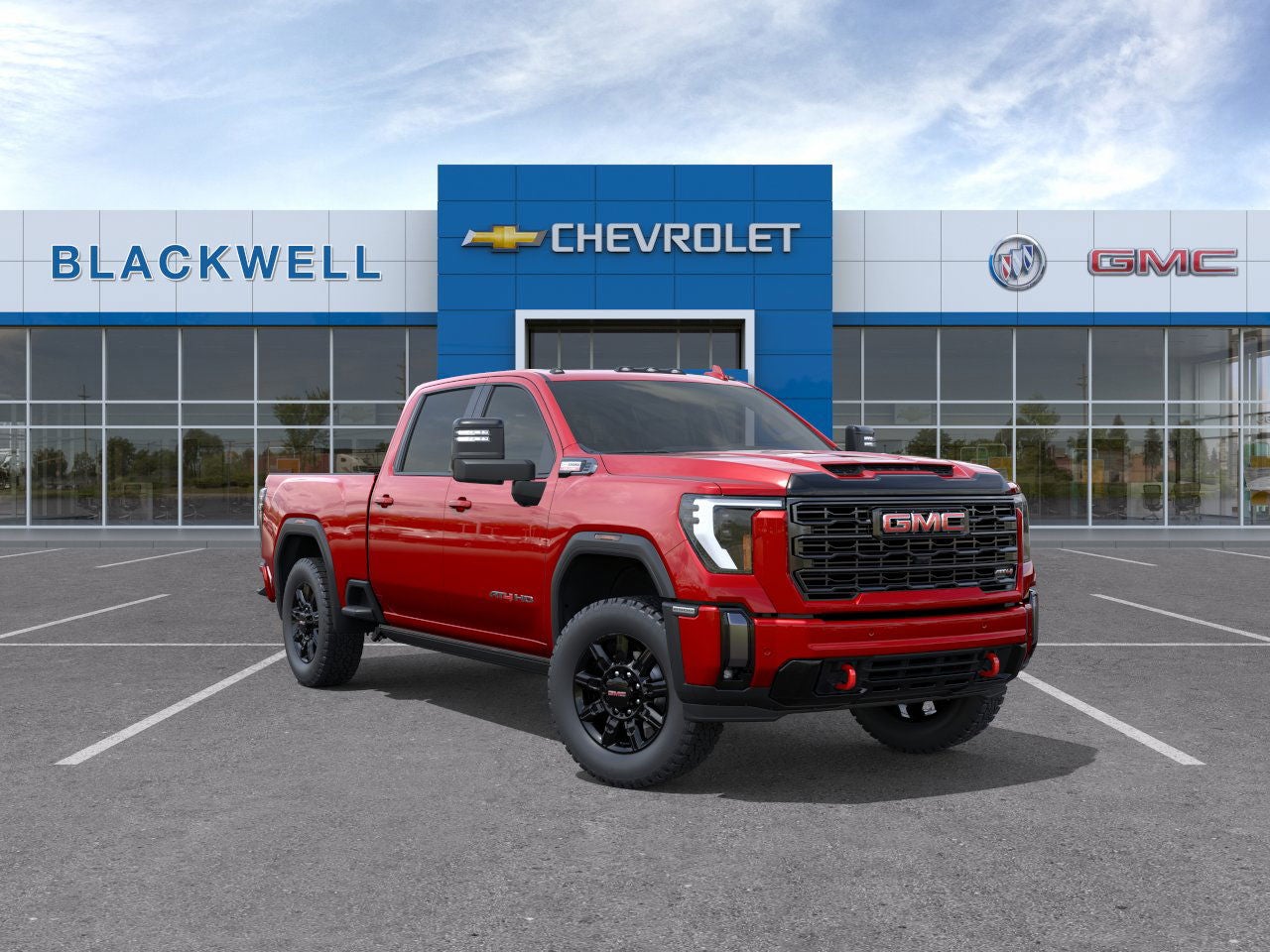 2026 GMC Sierra 2500 HD AT4 in Volcanic Red Tintcoat — front three-quarter view
